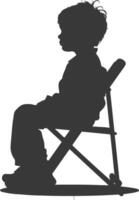 Silhouette little boy sitting in the chair black color only vector