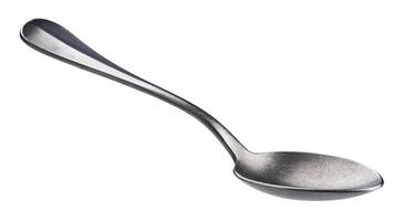Metal spoon isolated on white background photo