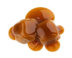 Caramel candies and caramel sauce isolated on white background, top view photo