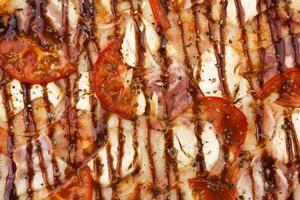 Close-up of barbecue chicken pizza, BBQ pizza texture photo