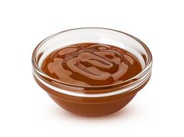 Caramel sauce isolated on white background photo