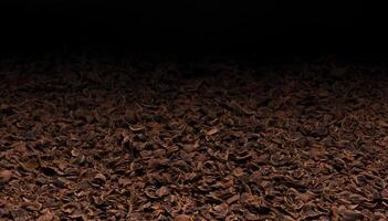 Grated chocolate texture. Ground chocolate background photo