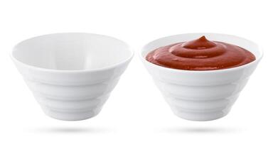 Ketchup sauce bowl and empty sauce bowl isolated over white photo