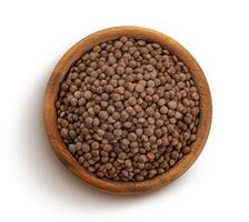 Brown lentils isolated on white background, top view photo
