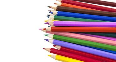 Close up of color pencils on white background with clipping path photo