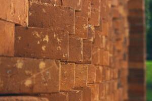 The arrangement of the bricks arranged in such a way forms a very beautiful building wall photo