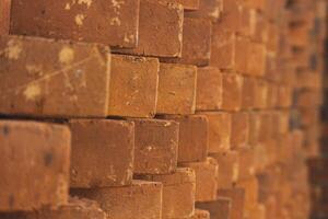 The arrangement of the bricks arranged in such a way forms a very beautiful building wall photo