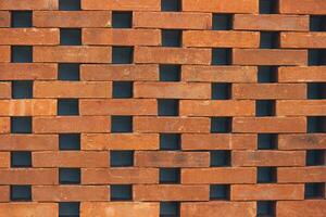 The arrangement of the bricks arranged in such a way forms a very beautiful building wall photo