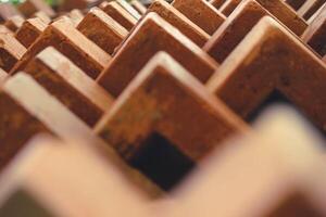 The arrangement of the bricks arranged in such a way forms a very beautiful building wall photo