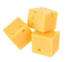 Cubes of cheese isolated on white photo