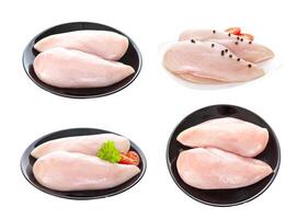 Raw chicken fillet or breast isolated on white photo