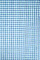 Blue checkered tablecloth background photo