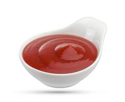 Tomato sauce in white bowl photo