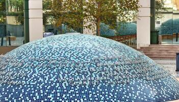 Kuala Lumpur, Malaysia on May 21, 2023. A semi-circular monument in the middle of the front of the Kuala Lumpur Library. photo