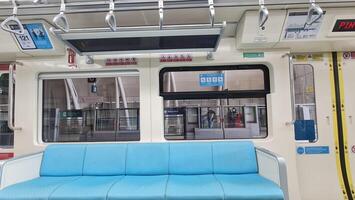 Jakarta, Indonesia on December 7, 2023. Interior of an Indonesian state-owned LRT Light Rail Transit photo