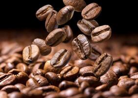 Falling coffee beans. Dark background with copy space photo