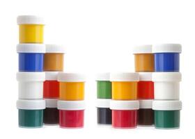 Gouache color paints, jars cans isolated on white photo