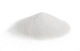 Pile of sugar isolated on white photo