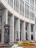 Tokyo, Japan on April 14, 2023. Sculptures in a garden full of flowers at the Tokyo Metropolitan Government Building Government office. photo