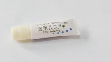 Tokyo, Japan on 1 Oct 2023. Isolated photo of one of the hotel amenities, a small toothpaste containing medicine.