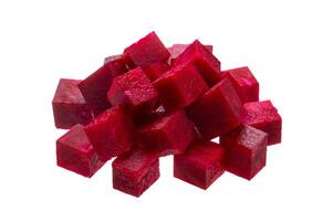 Sliced beetroot cubes isolated on white background photo