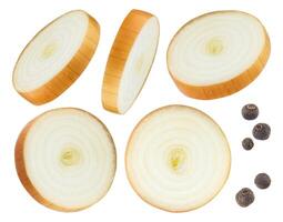 Onion slices and black pepper isolated on white background photo