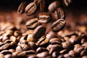 Coffee beans falling on pile photo