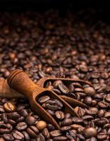 Coffee beans. Dark background with copy space, close-up photo