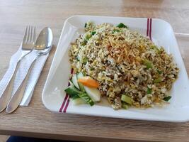 One of the signature dishes from Indonesian restaurants, Nasi Goreng Bebek Cabe Ijo. photo