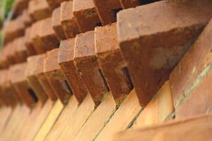 The arrangement of the bricks arranged in such a way forms a very beautiful building wall photo