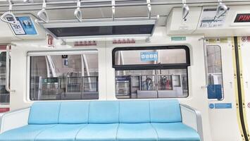 Jakarta, Indonesia on December 7, 2023. Interior of an Indonesian state-owned LRT Light Rail Transit photo