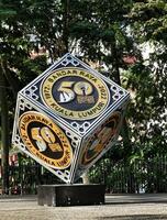 Kuala Lumpur, Malaysia on May 21 2023. A cube-shaped monument to commemorate Dirgahayu Bandar Raya Kuala Lumpur 1972 - 2022. Located in city center photo