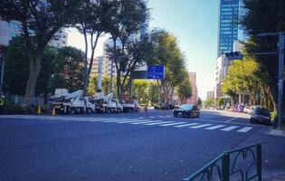 Tokyo, Japan on October 1, 2023. Several people are walking on a zebra cross. photo
