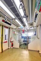 Jakarta, Indonesia on December 7, 2023. Interior of an Indonesian state-owned LRT Light Rail Transit photo