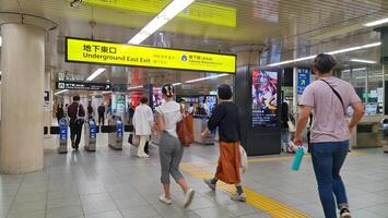 Kyoto, Japan on October 1, 2023. Entrance and exit gates of a station that will board the Karasuma Line. photo