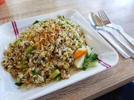 One of the signature dishes from Indonesian restaurants, Nasi Goreng Bebek Cabe Ijo. photo