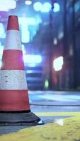 A traffic cone sitting on the side of a road video