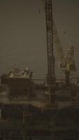 An oil rig standing tall in the vast expanse of the ocean video