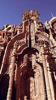 Ornate temple wall adorned with statues video