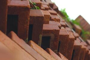 The arrangement of the bricks arranged in such a way forms a very beautiful building wall photo
