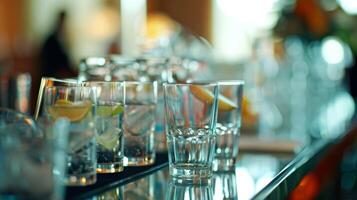 An empty bar at a networking event with nonalcoholic mocktails and refreshments available instead photo
