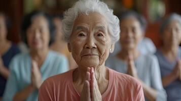 A montage of seniors from different walks of life all joining together for a virtual exercise class highlighting the power of technology to bring people together photo