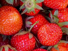 Strawberry. Fresh organic berries. Close-up. Fruit background. Healthy eating concept photo