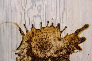 Coffee stains isolated on a white table. High-quality stock photo image. Tea Stains Left by Cup Bottoms on wood surface. Round cafe stain fleck drink beverage. Copy space. Wooden texture background
