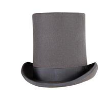 Magic hat. Topper. Elegant vintage gray beige wool felt top hat with black band on the wooden hat block. Grosgrain ribbon trim around rolled brim. Isolated on white background. Close-up. Copy space. photo