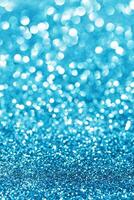Blue sparkle. Glitter background. photo