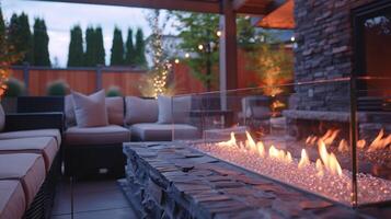 A unique seethrough fireplace is the centerpiece of this outdoor lounge area providing the perfect spot for cozy gatherings on cool evenings. 2d flat cartoon photo