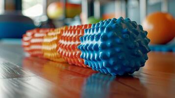 Some athletes use foam rollers and lacrosse balls to massage out any remaining knots in their muscles. photo