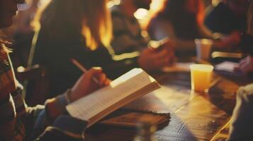 A member sharing a powerful quote from the current book while others nod in agreement and take notes photo