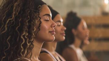 A group of women participate in a sauna ritual combining heat therapy with gentle guided meditations to promote mental clarity and emotional balance. photo